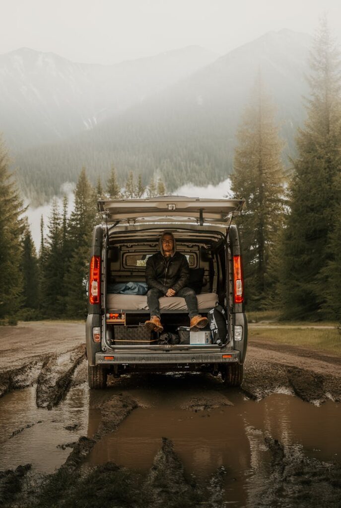 man car camping in the rain